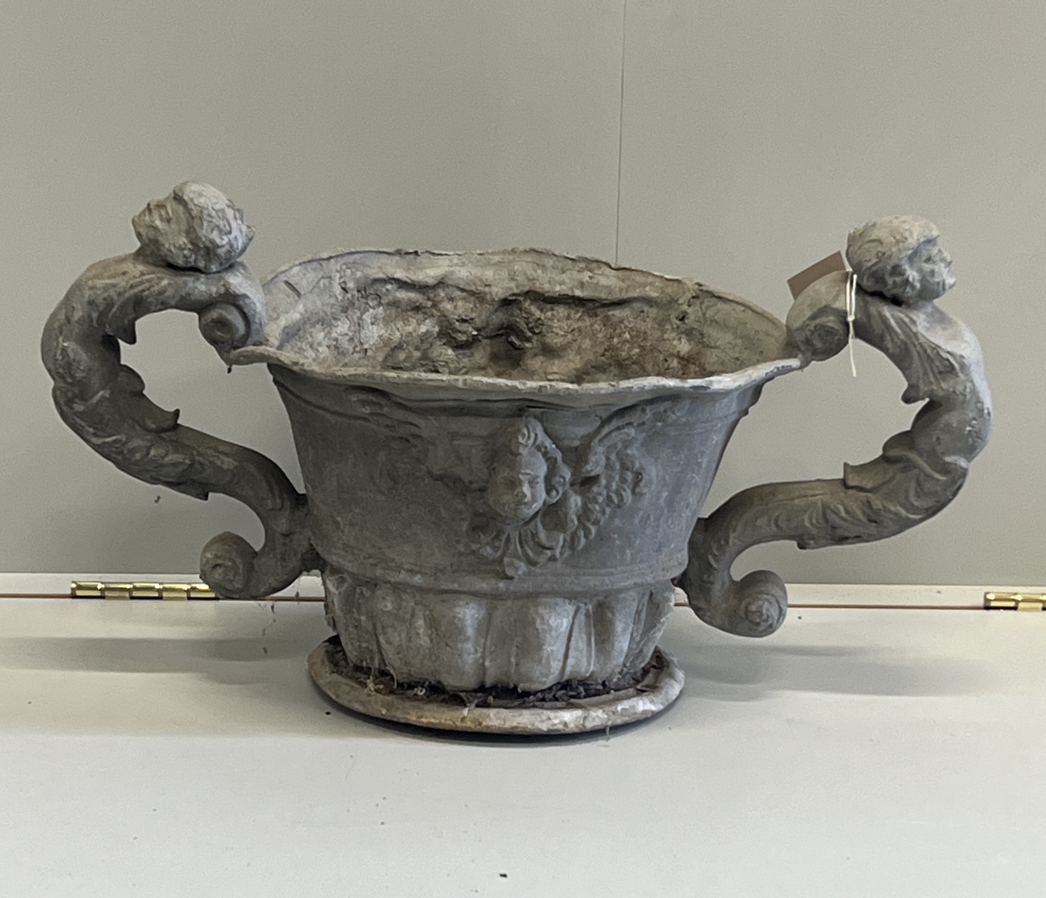 A Victorian lead twin handled urn, width 63cm, height 36cm